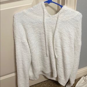 white fuzzy sweater